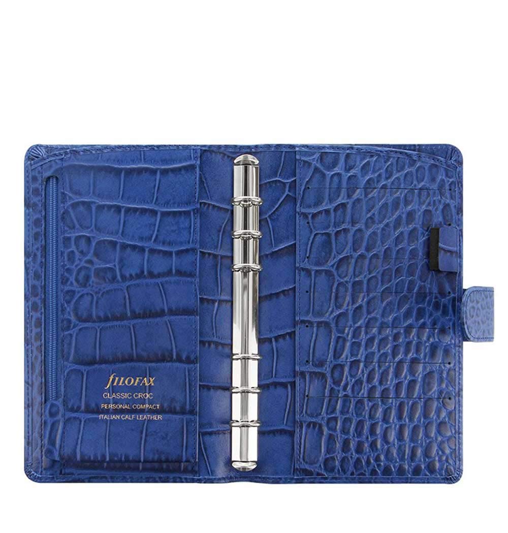 Filofax Classic Croc Print Personal Compact Size Leather Organizer Indigo 2024. Sumptuously soft textured croc effect Filofax leather organizer crafted from luxury Italian calf leather.